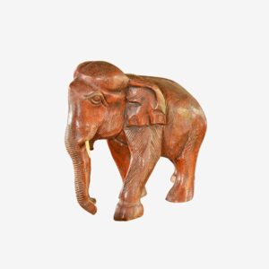 A wooden elephant with two trunks on its back.