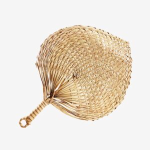A fan made of straw is shown.